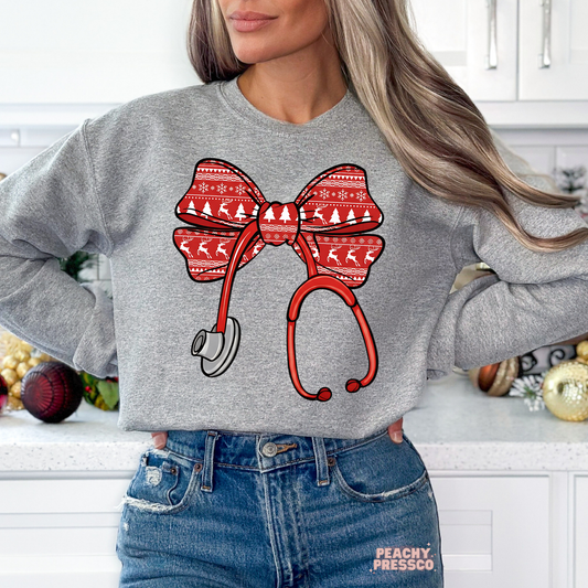 Christmas Nurse Shirt – Festive Red Bow with Stethoscope, Holiday Apparel