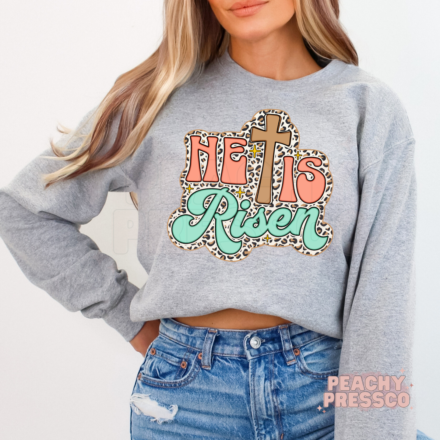He Is Risen Leopard Print Cross Sweatshirt – Retro Coral & Mint Pastel Christian Pullover
