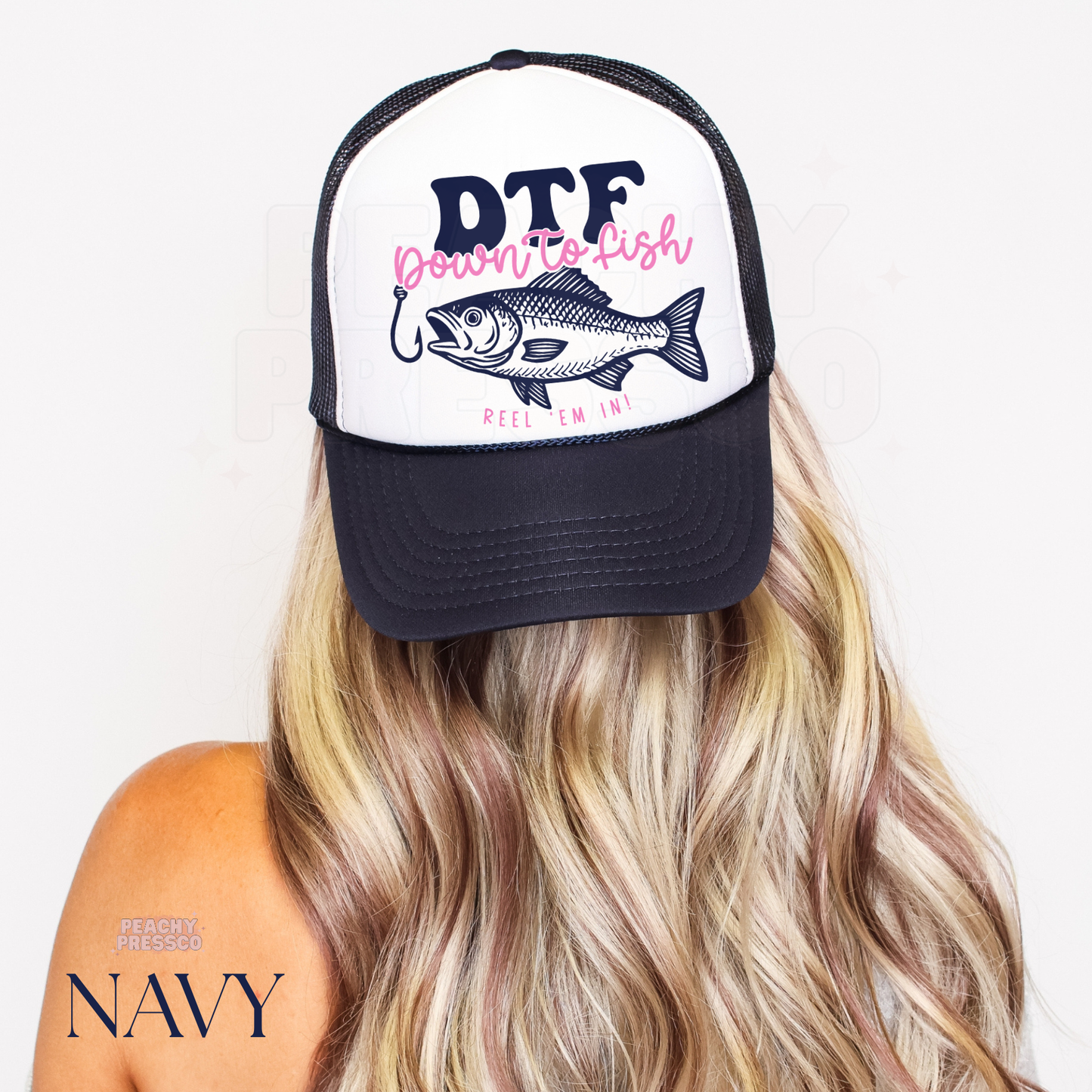 Women’s navy trucker hat featuring Down To Fish bass illustration and playful fishing design for beach, boating and outdoor wear.
