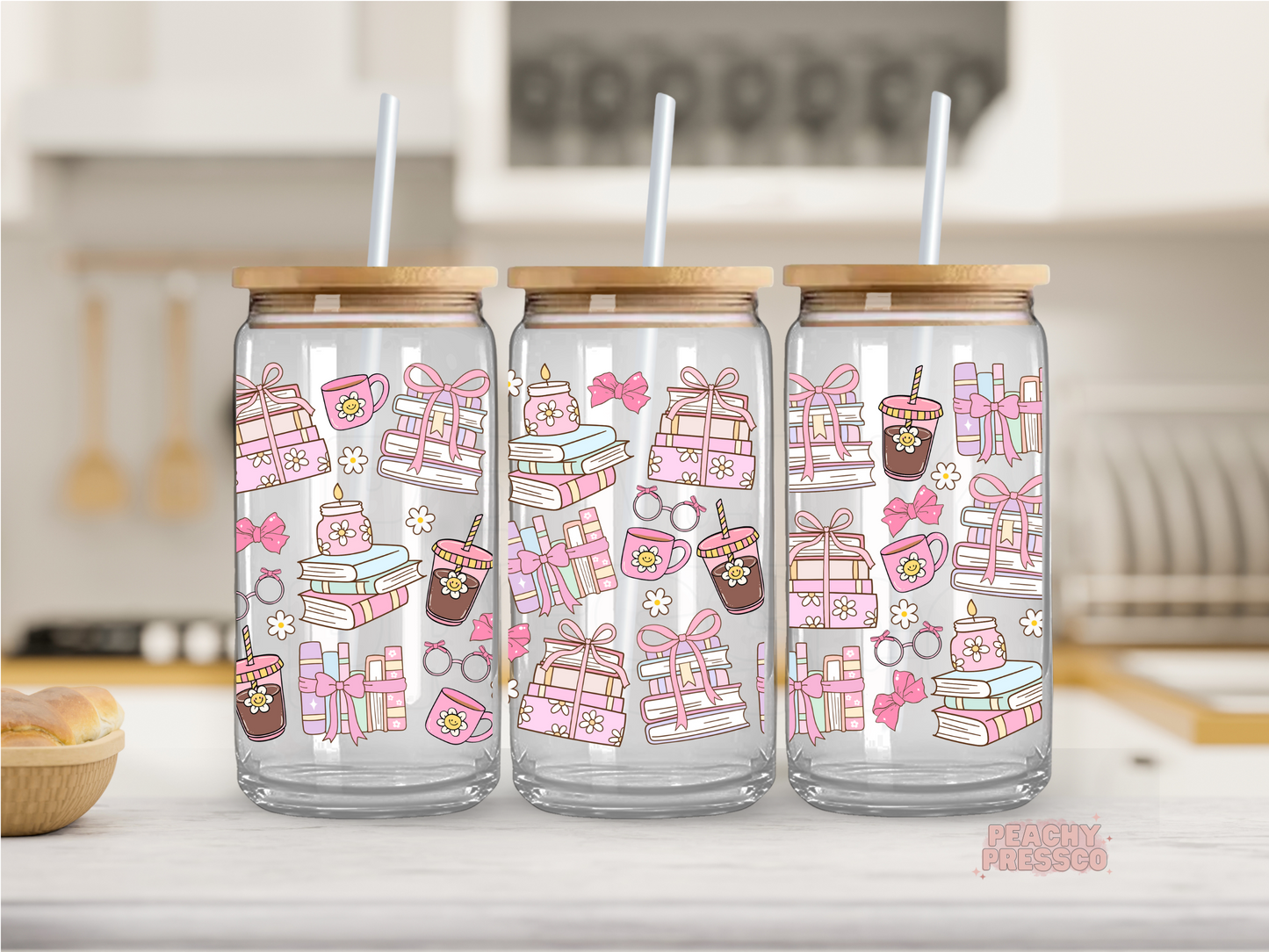16 oz glass cup with a cute book lover wrap featuring pink books, bows, coffee cups, candles, flowers, and a cozy coquette reading aesthetic.