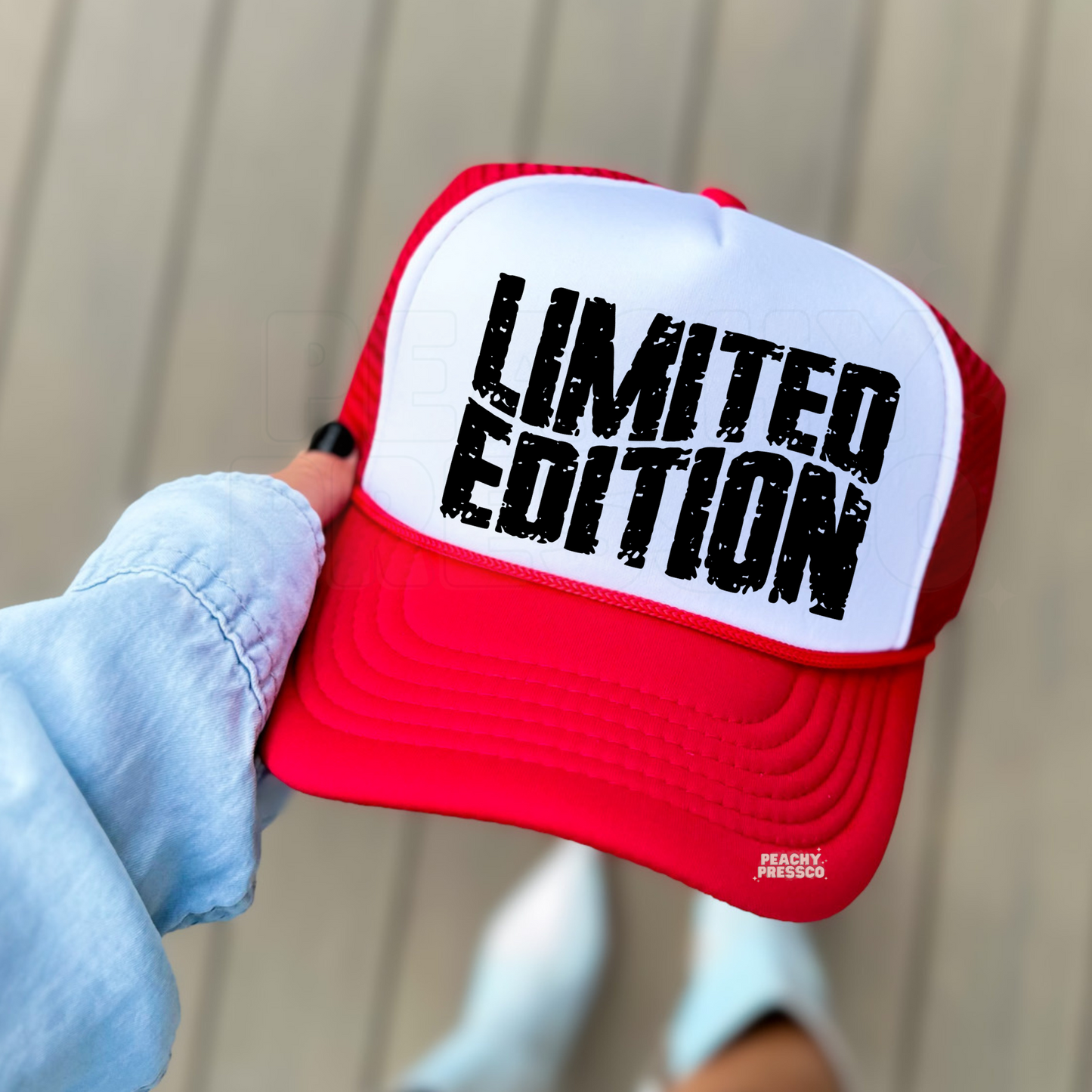 Red and white foam trucker hat with distressed black "LIMITED EDITION" graphic. Stylish statement hat for summer, festivals, vacations, concerts, and everyday casual wear.