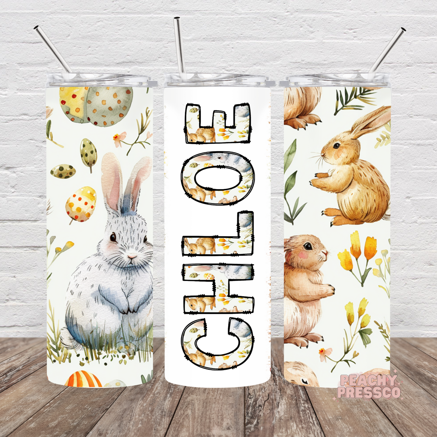 20oz skinny tumbler featuring watercolor Easter bunnies, floral eggs, wildflowers, and a personalized name design in a soft spring aesthetic.