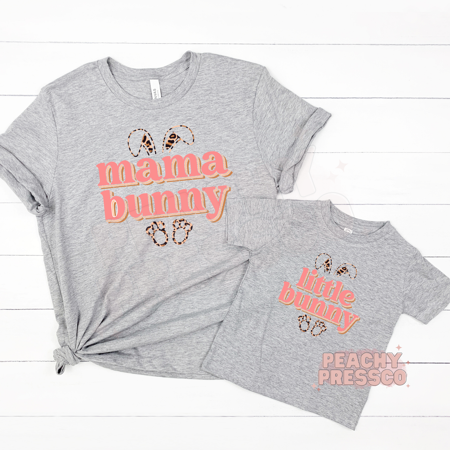 Grey Mama Bunny and Little Bunny matching shirts flat lay, leopard bunny ears design, mom and mini Easter outfit