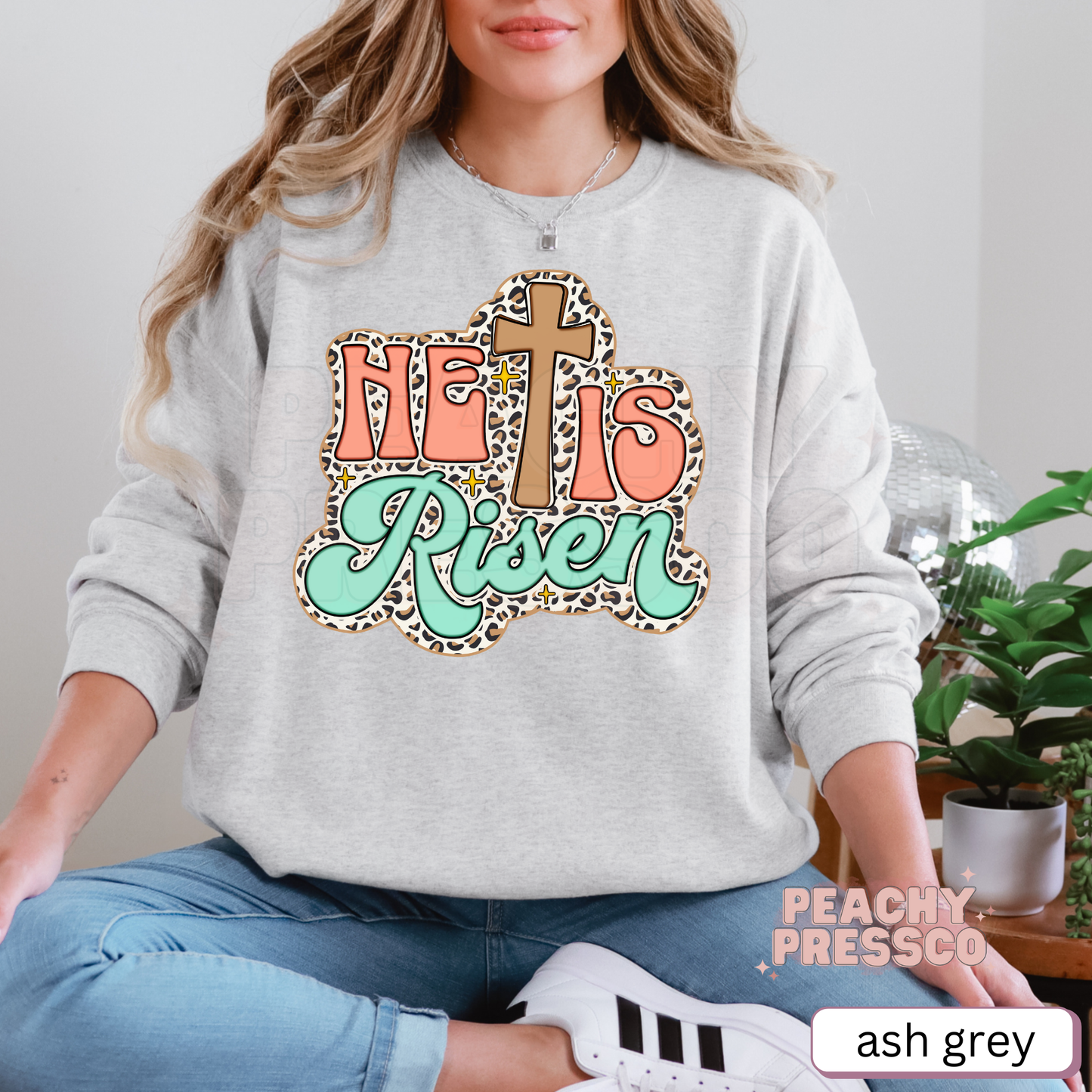 He Is Risen Leopard Print Cross Sweatshirt – Retro Coral & Mint Pastel Christian Pullover