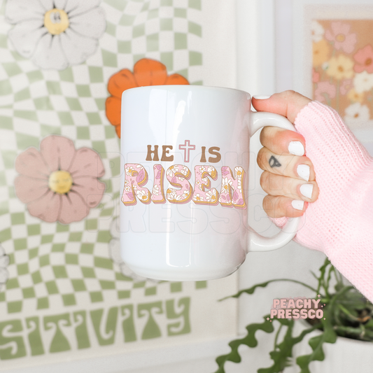 He Is Risen Floral Mug – Christian Easter Coffee Cup with Retro Daisies