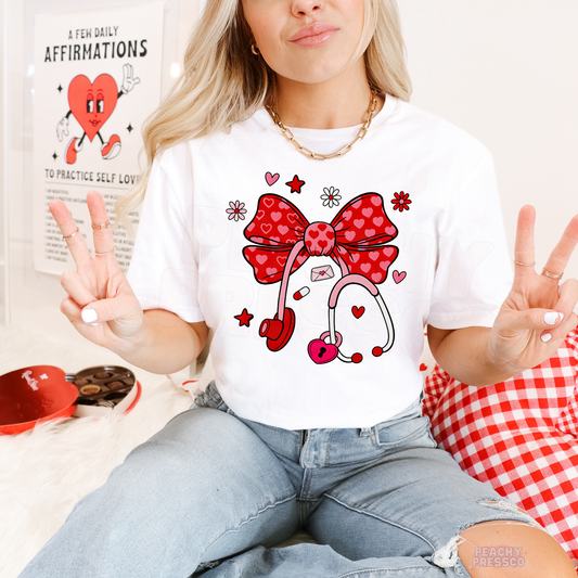 Nurse Heart Bow Stethoscope Shirt, Valentine’s Day Apparel for Health Care Workers