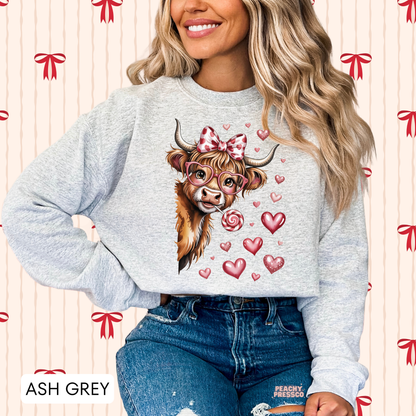 Cute Highland Cow Valentine Sweatshirt | Bow Glasses Lollipop, Valentine’s Day Apparel