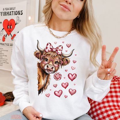 Cute Highland Cow Valentine Sweatshirt | Bow Glasses Lollipop, Valentine’s Day Apparel
