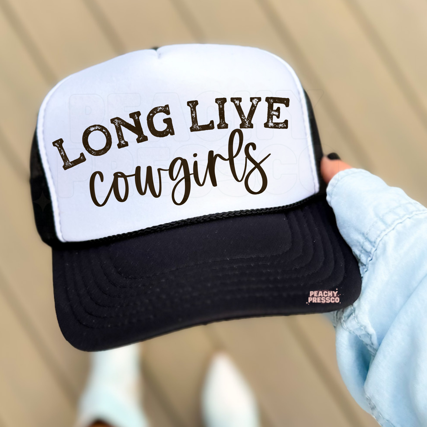 White and black trucker hat featuring “Long Live Cowgirls” design. Cute western trucker cap for country girls, concerts, rodeos and everyday wear.