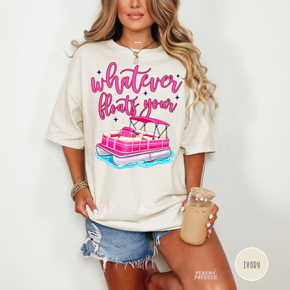 Ivory oversized graphic tee featuring pink pontoon boat and “Whatever Floats Your” lettering – cute boating and beach vacation shirt.