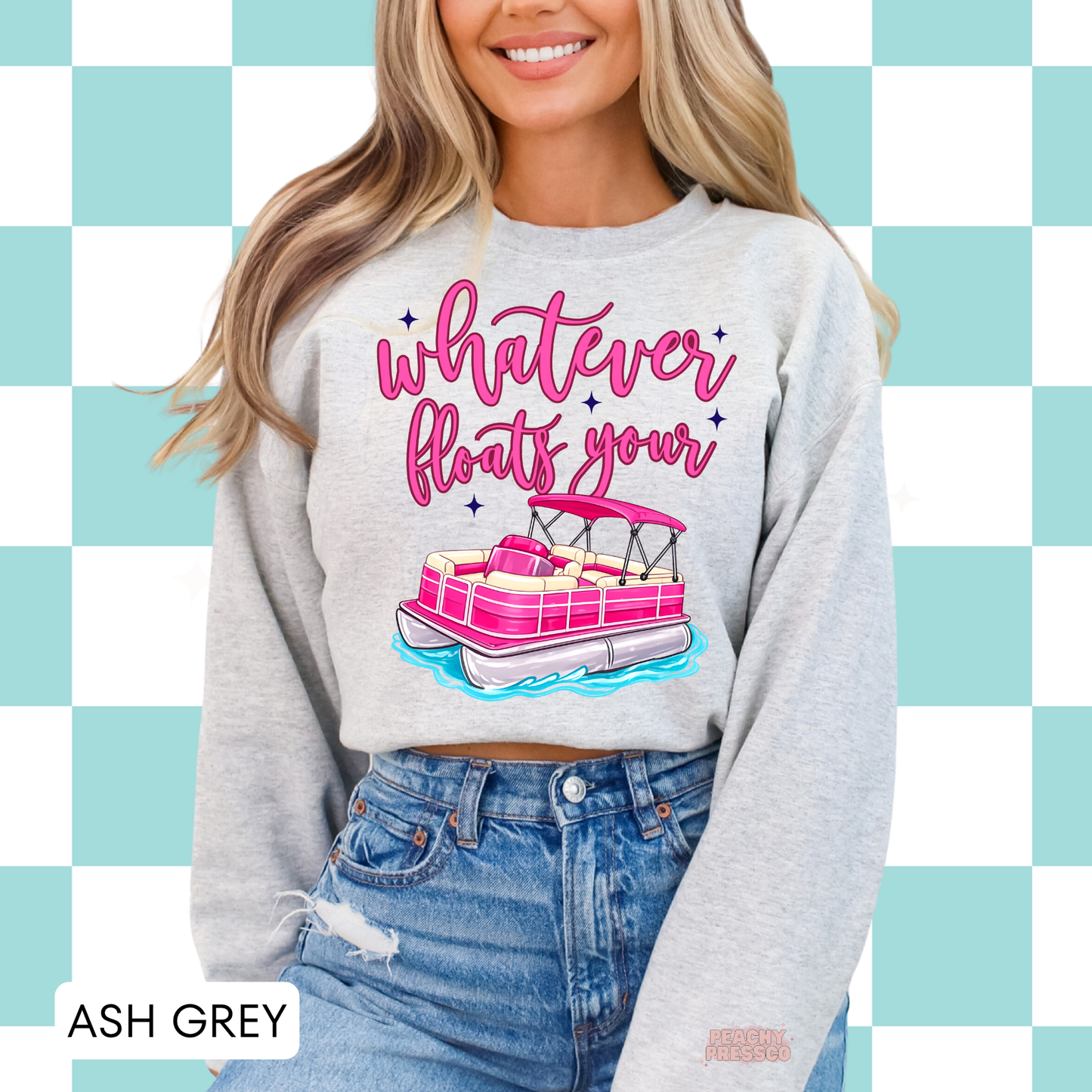 Ash grey crewneck sweatshirt with pink pontoon boat graphic and “Whatever Floats Your” saying – trendy women’s lake day sweatshirt.