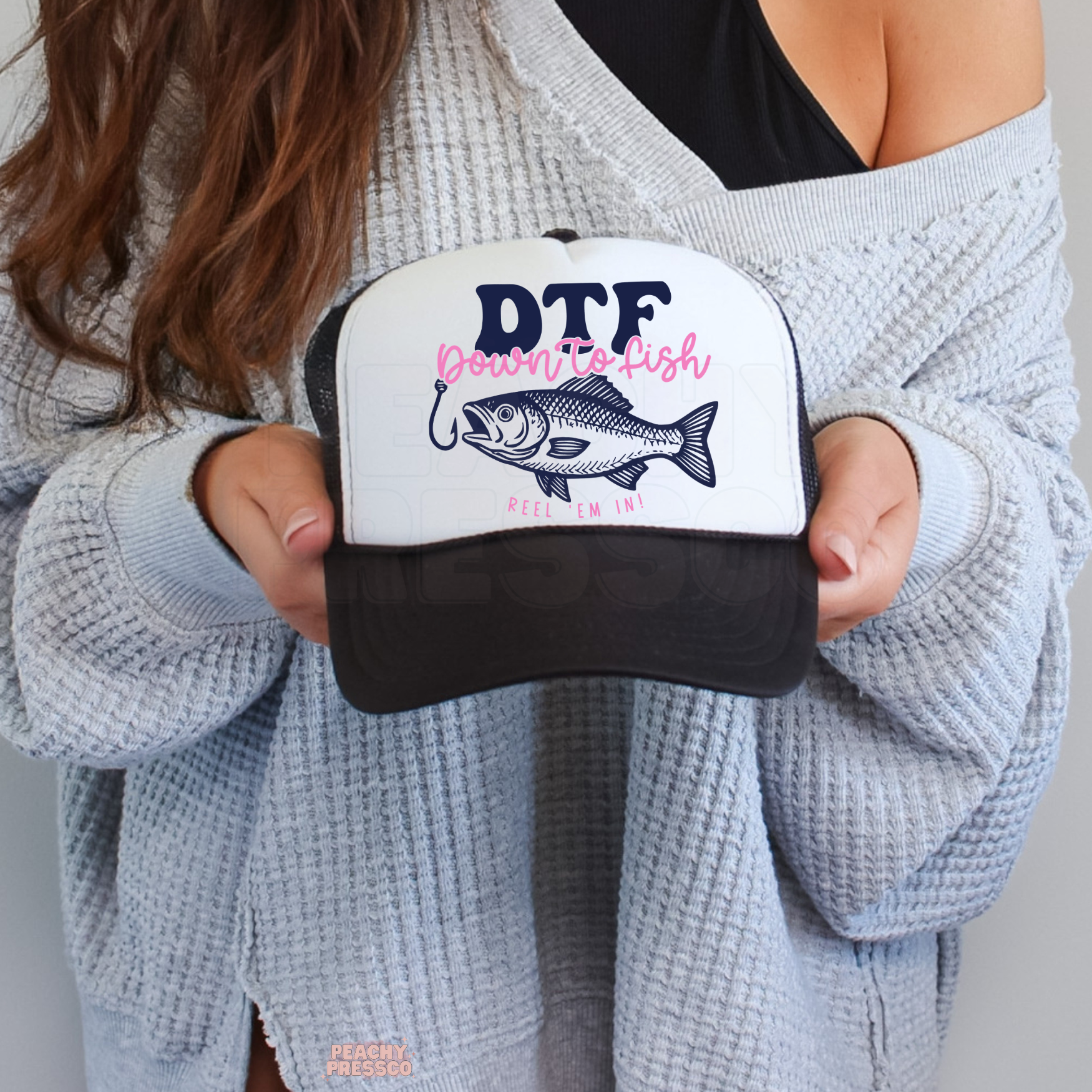 Black and white trucker hat featuring fish illustration and Down To Fish text.
