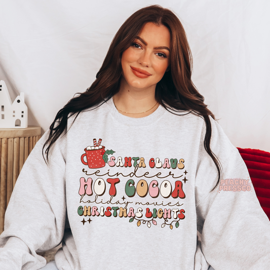 Santa Claus Reindeer Hot Cocoa Christmas Lights Tee – Holiday Movies Apparel