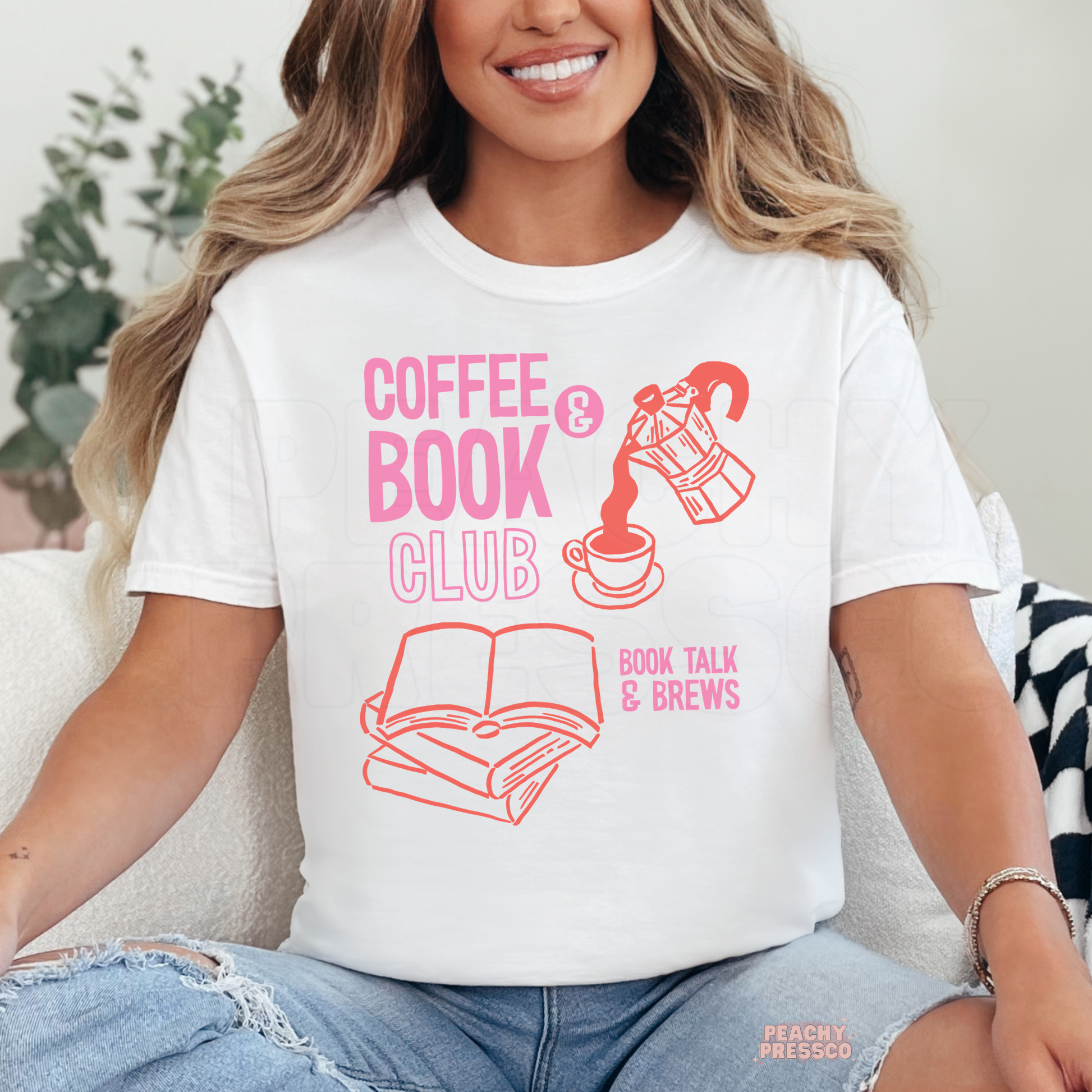 Coffee and Book Club graphic t-shirt in white with pink and orange reading themed design