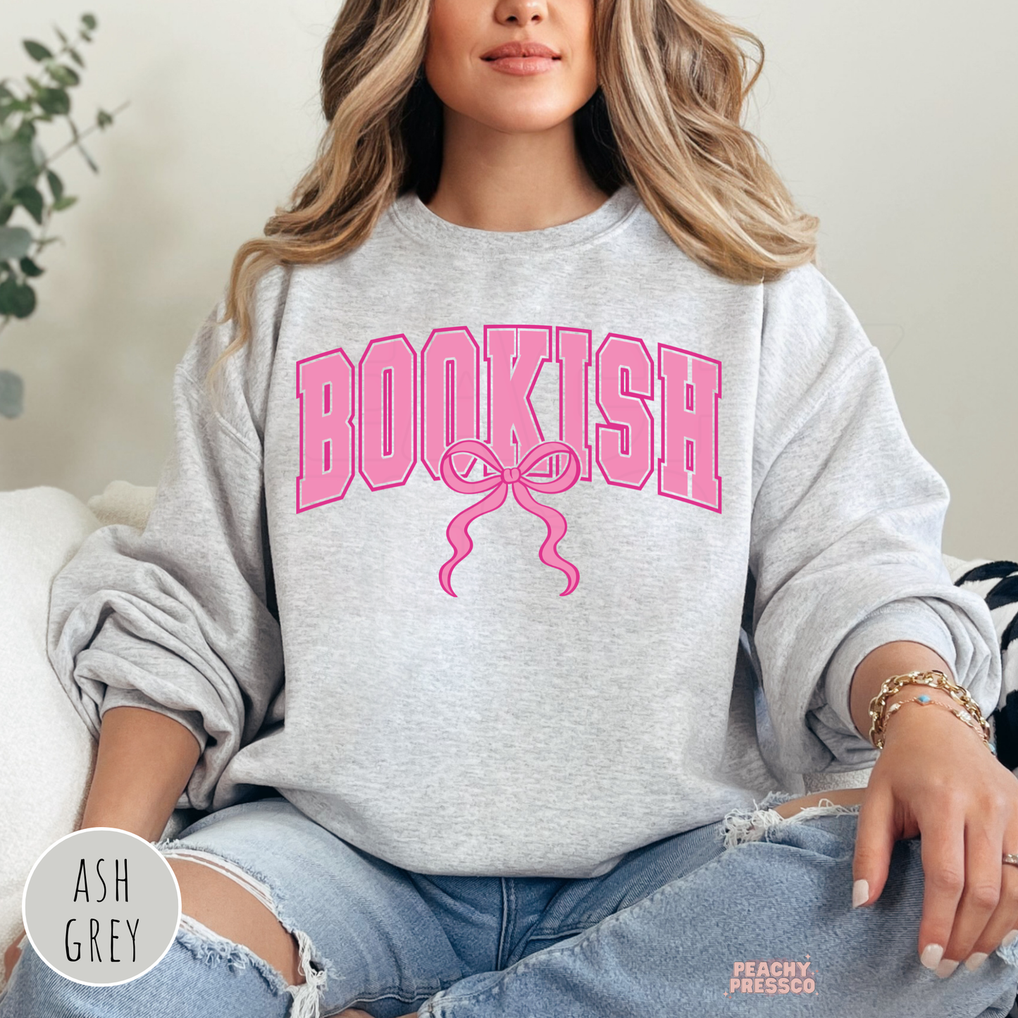 Ash grey crewneck with pink bookish bow graphic for casual book lover aesthetic