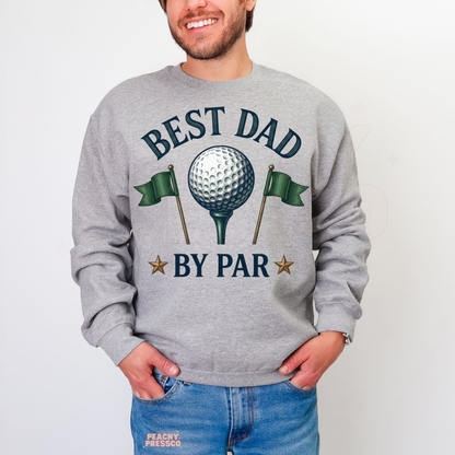 Man wearing grey crewneck sweatshirt with vintage golf-themed “Best Dad By Par” graphic featuring golf ball and flags.