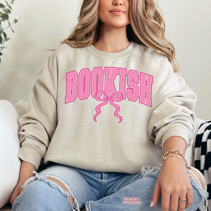 Beige neutral sweatshirt with pink bookish bow design for soft aesthetic outfit