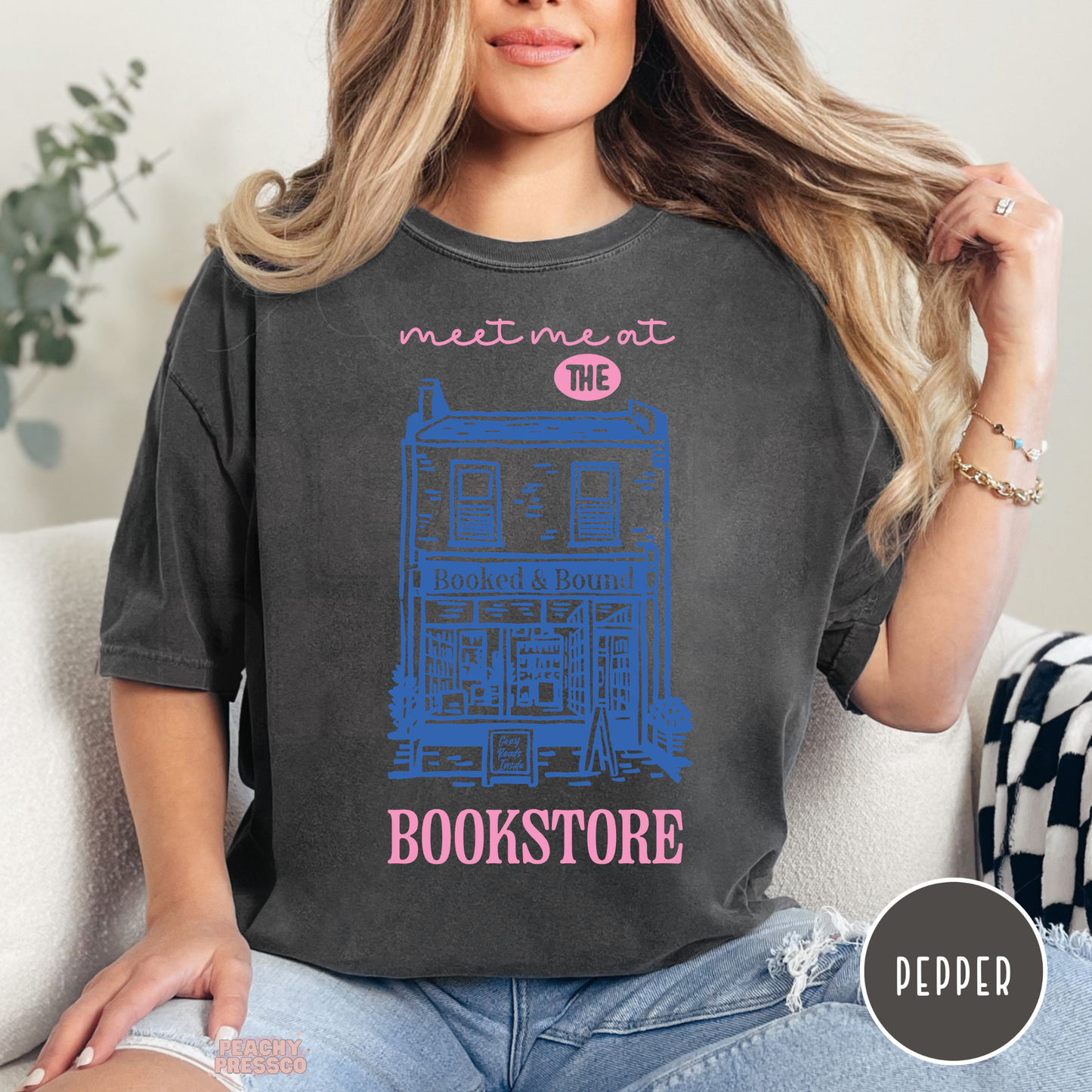 Meet me at the bookstore graphic t-shirt in pepper grey with illustrated bookstore design for book lovers