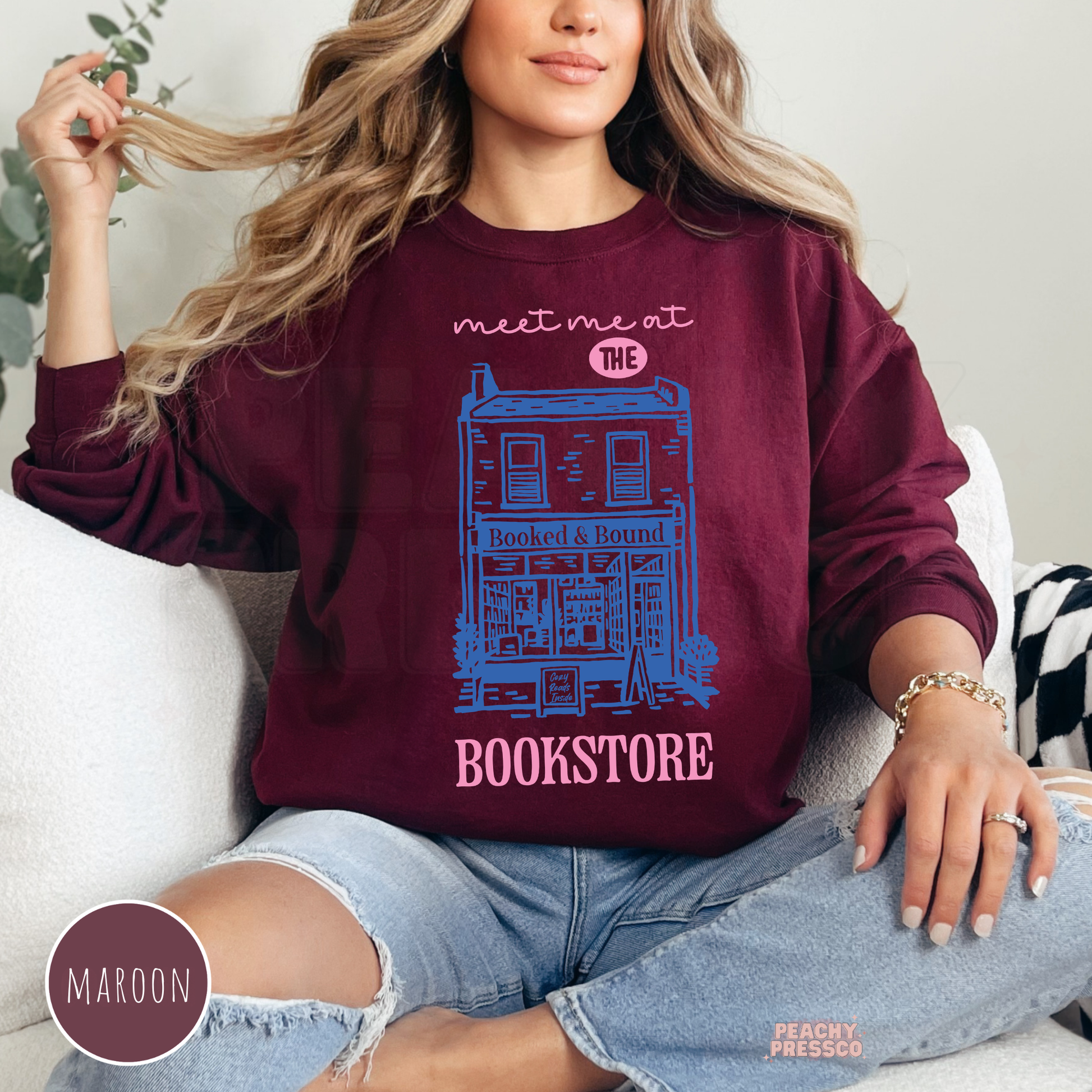 Meet me at the bookstore cozy sweatshirt in maroon with vintage bookstore graphic for readers