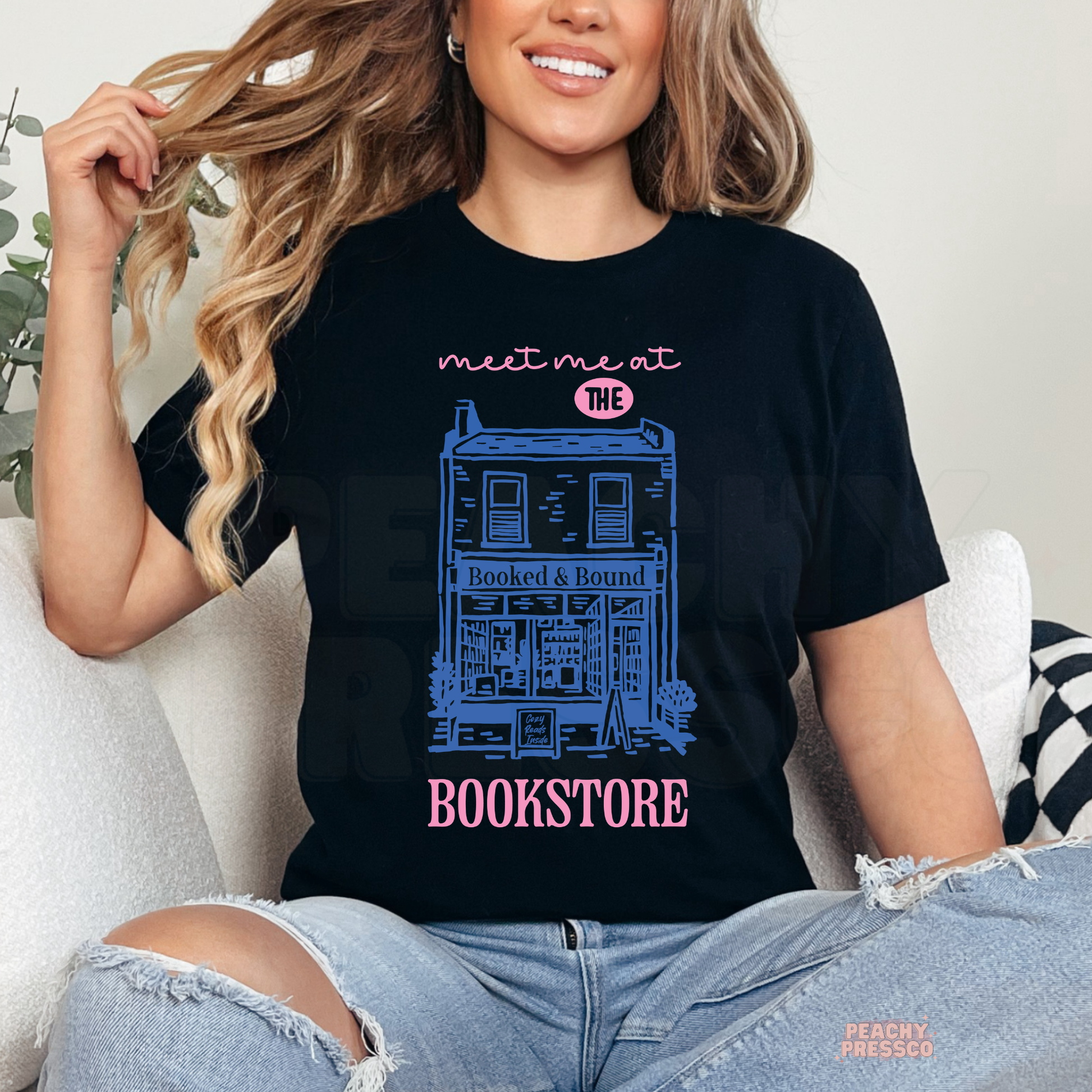 Meet me at the bookstore graphic t-shirt in black with aesthetic bookshop illustration for book lovers
