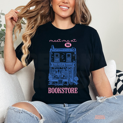 Meet me at the bookstore graphic t-shirt in black with aesthetic bookshop illustration for book lovers