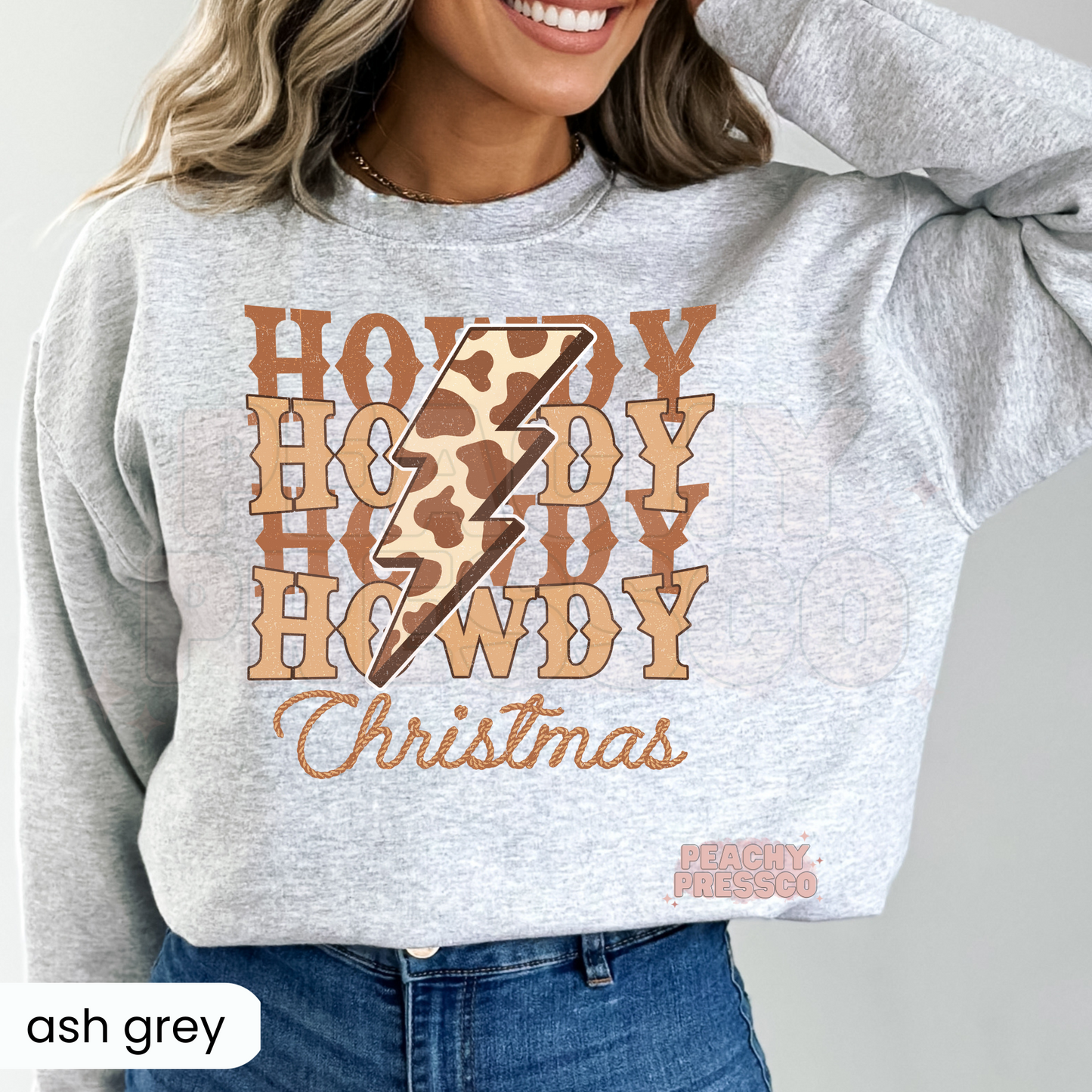 Howdy Christmas Sweatshirt – Western Holiday Style with Cowprint Bolt Apparel