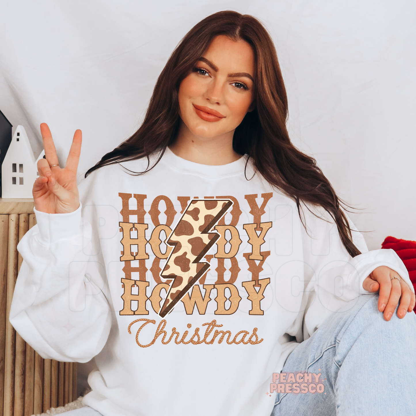 Howdy Christmas Sweatshirt – Western Holiday Style with Cowprint Bolt Apparel