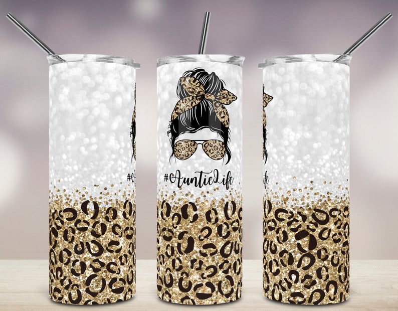 20oz skinny tumbler featuring gold glitter leopard print and Auntie Life messy bun design.