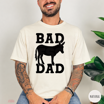 Natural color unisex t-shirt with a humorous "Bad Ass Dad" donkey graphic, perfect Father's Day gift for dads who love western humor.