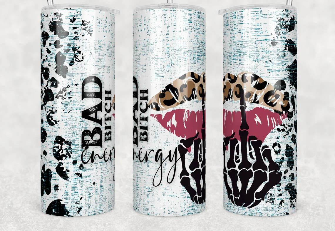 Skinny tumbler featuring leopard print lips, a skeleton hand, distressed turquoise background, and the phrase "Bad Energy Bitch."