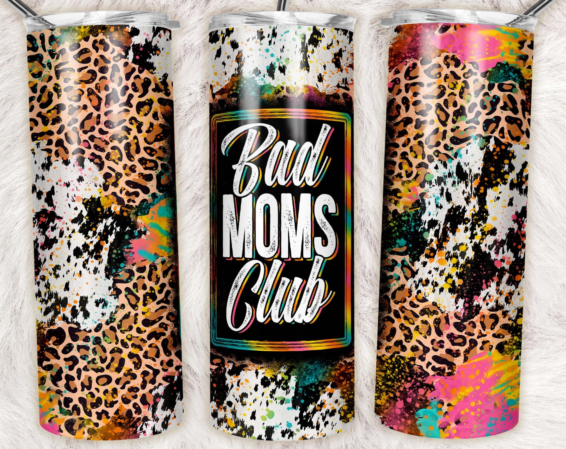 20oz skinny tumbler with colorful paint splatter, leopard print, and Bad Moms Club design on a stainless steel travel tumbler.