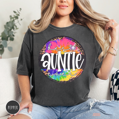 Pepper Comfort Colors garment-dyed t-shirt featuring a colorful tie-dye and leopard print "Best Auntie Ever" graphic. Relaxed-fit tee for the coolest aunt.