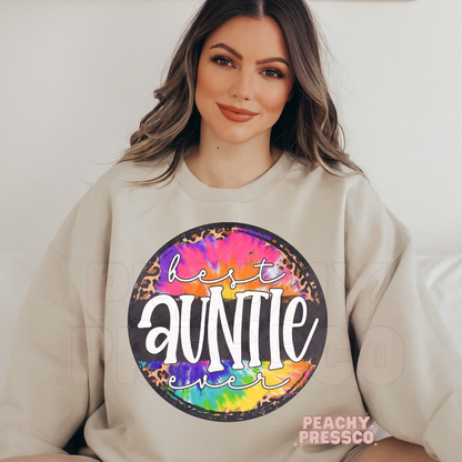Sand crewneck sweatshirt featuring a vibrant tie-dye and leopard print "Best Auntie Ever" graphic. Cozy gift for stylish aunts who love colorful designs.