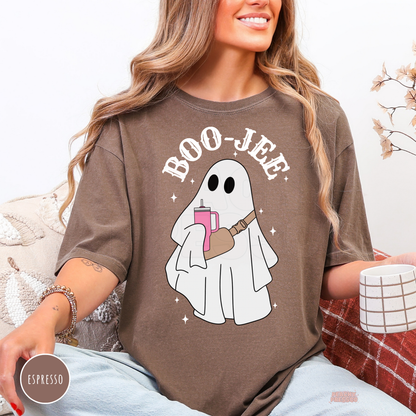 Woman wearing an espresso Comfort Colors Boo-Jee ghost Halloween t-shirt with ghost holding a pink tumbler.
