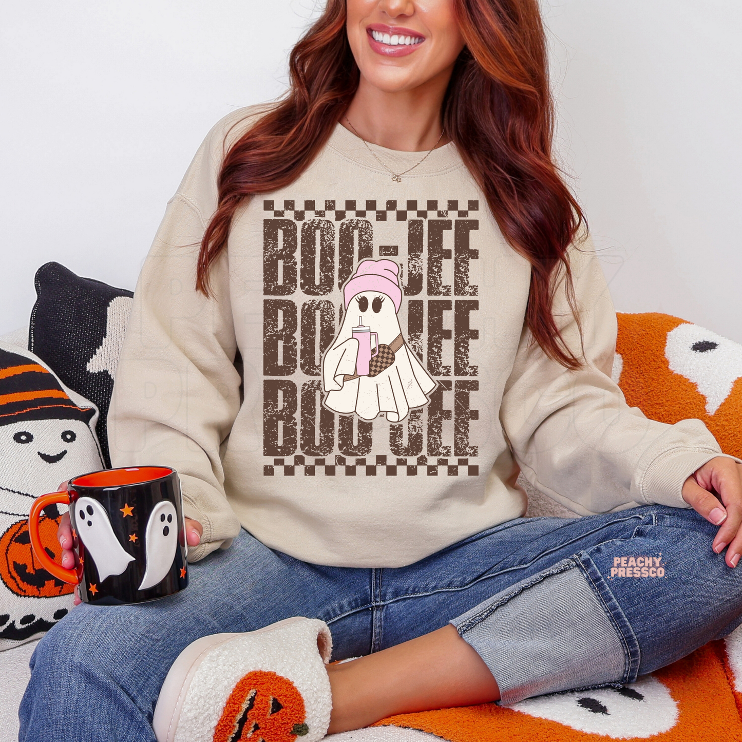 Sand Halloween sweatshirt with a girly Boo-Jee ghost wearing a pink beanie and holding a drink