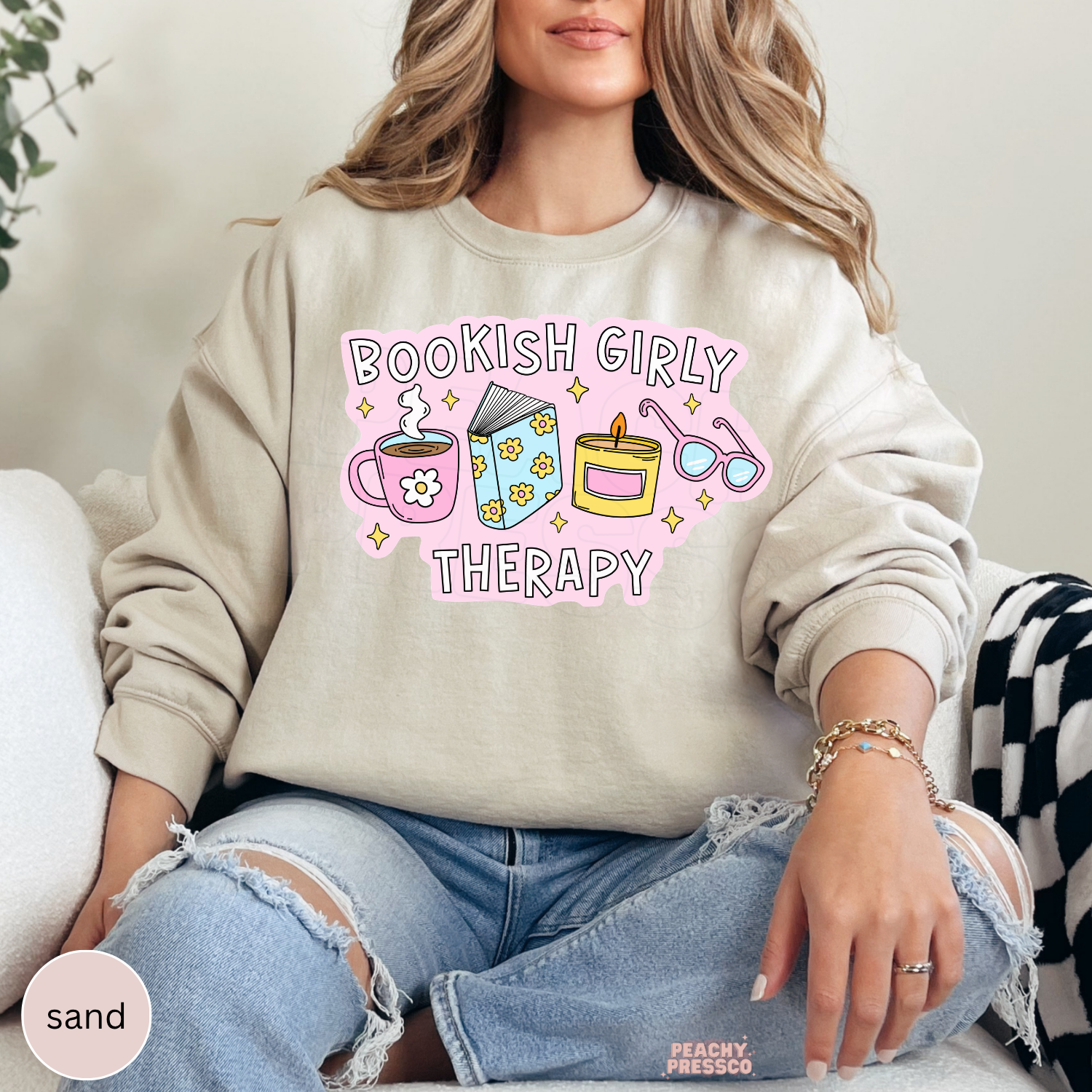 Sand crewneck sweatshirt with cute Bookish Girly Therapy design for readers, bookworms, and coffee lovers.