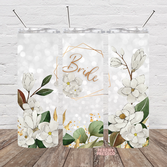 20oz skinny tumbler featuring white watercolor floral artwork with gold accents and a personalized "Bride" design. Ideal for brides-to-be, engagement gifts, bridal showers, bachelorette parties, wedding mornings, and honeymoon travel.