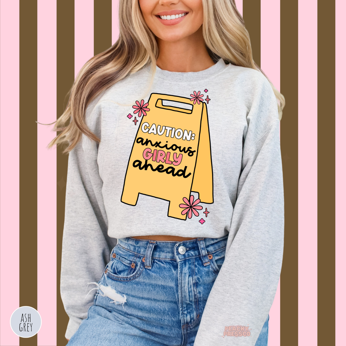 Ash grey Caution Anxious Girly Ahead sweatshirt featuring a cute yellow caution sign with pink floral accents and humorous anxious girly lettering.