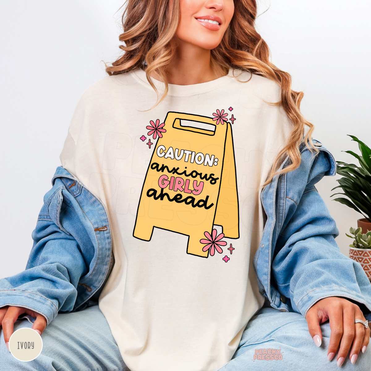 Ivory Caution Anxious Girly Ahead sweatshirt featuring a yellow warning sign with black and pink typography, pink flowers and funny anxious girl humor.