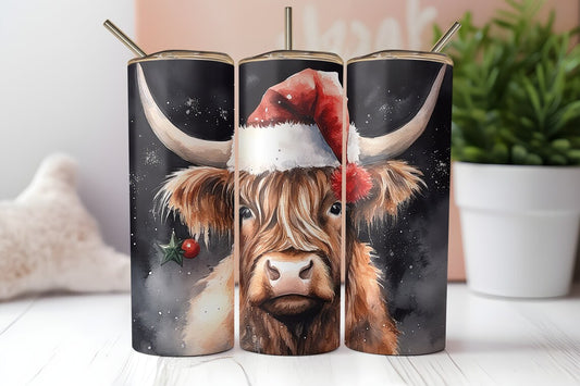 20oz stainless steel tumbler featuring a watercolor fluffy Highland cow wearing a red Santa hat on a dark snowy background.