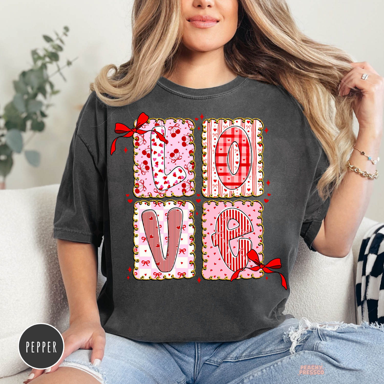 Pepper Comfort Colors t-shirt featuring a coquette LOVE patchwork design with pink patterned letters, red bows, hearts, and vintage Valentine's details.