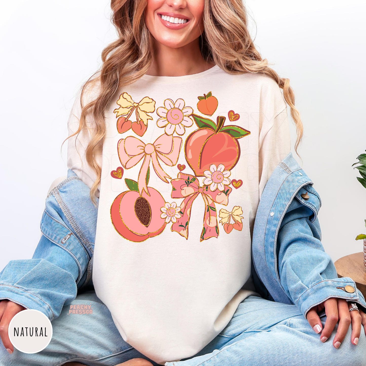 Natural Comfort Colors t-shirt featuring a pastel peach, bow, flower, and cherry collage with coquette-inspired artwork for a cute cottagecore summer style.