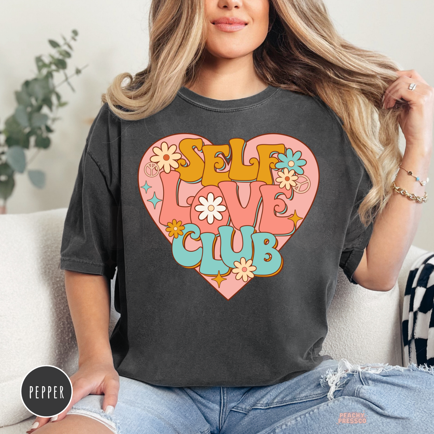 Pepper Comfort Colors shirt with a bold Self Love Club heart graphic, vintage floral accents, and retro Valentine's style.