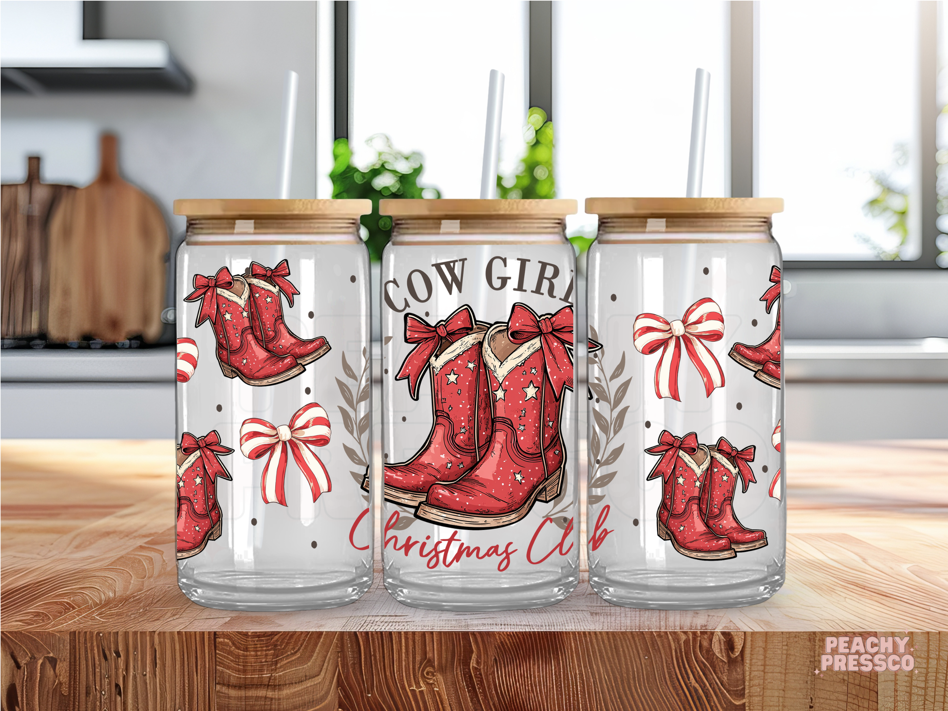 16oz clear glass cup with bamboo lid featuring red western cowboy boots with bows and Cowgirl Christmas Club script text.