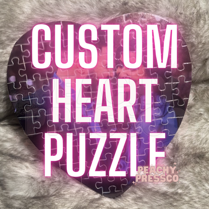 A custom heart-shaped jigsaw puzzle piece with a photo
