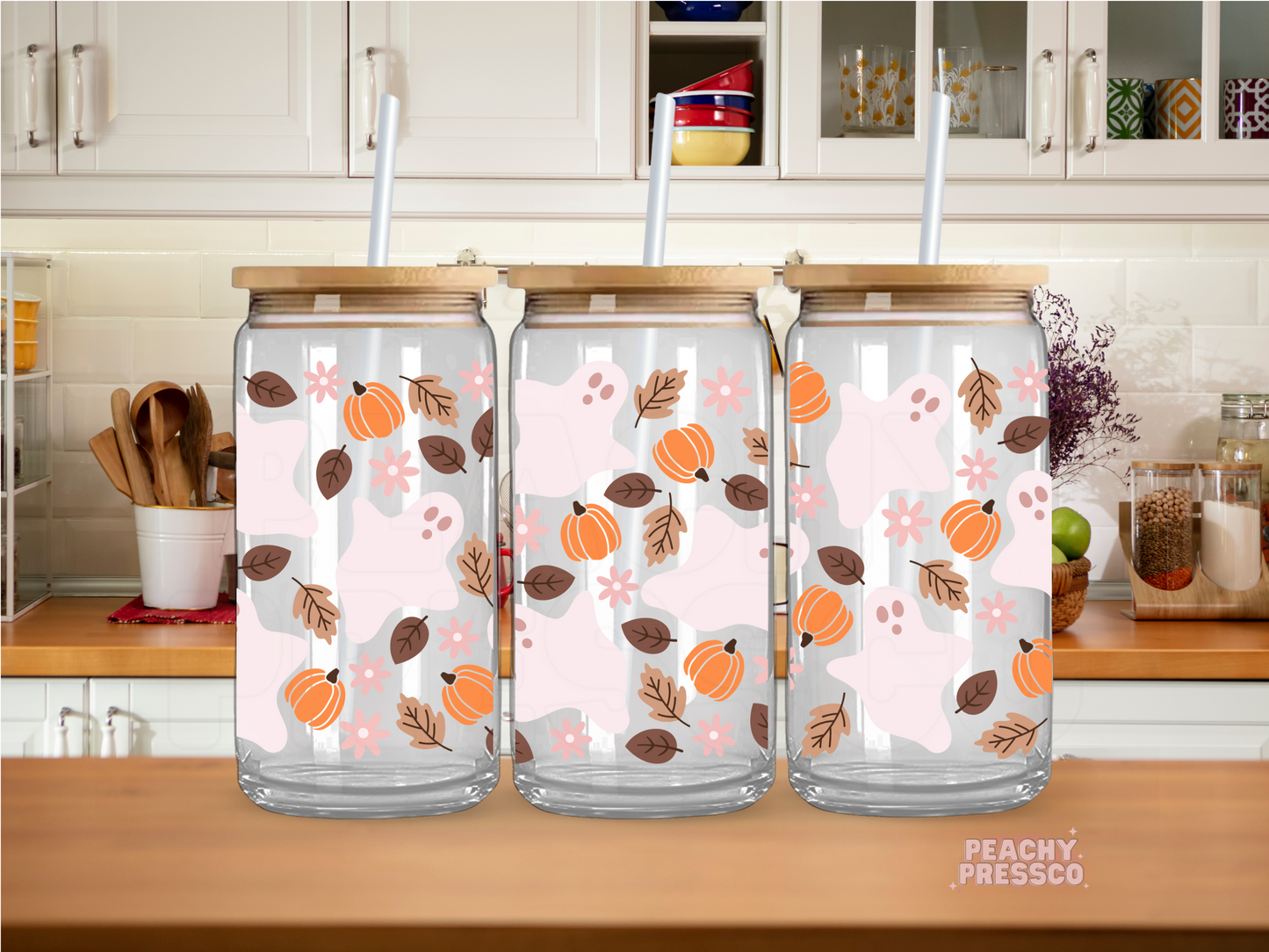 16oz glass cup featuring pink ghosts, pumpkins, autumn leaves, and flowers in a cute seamless fall pattern.
