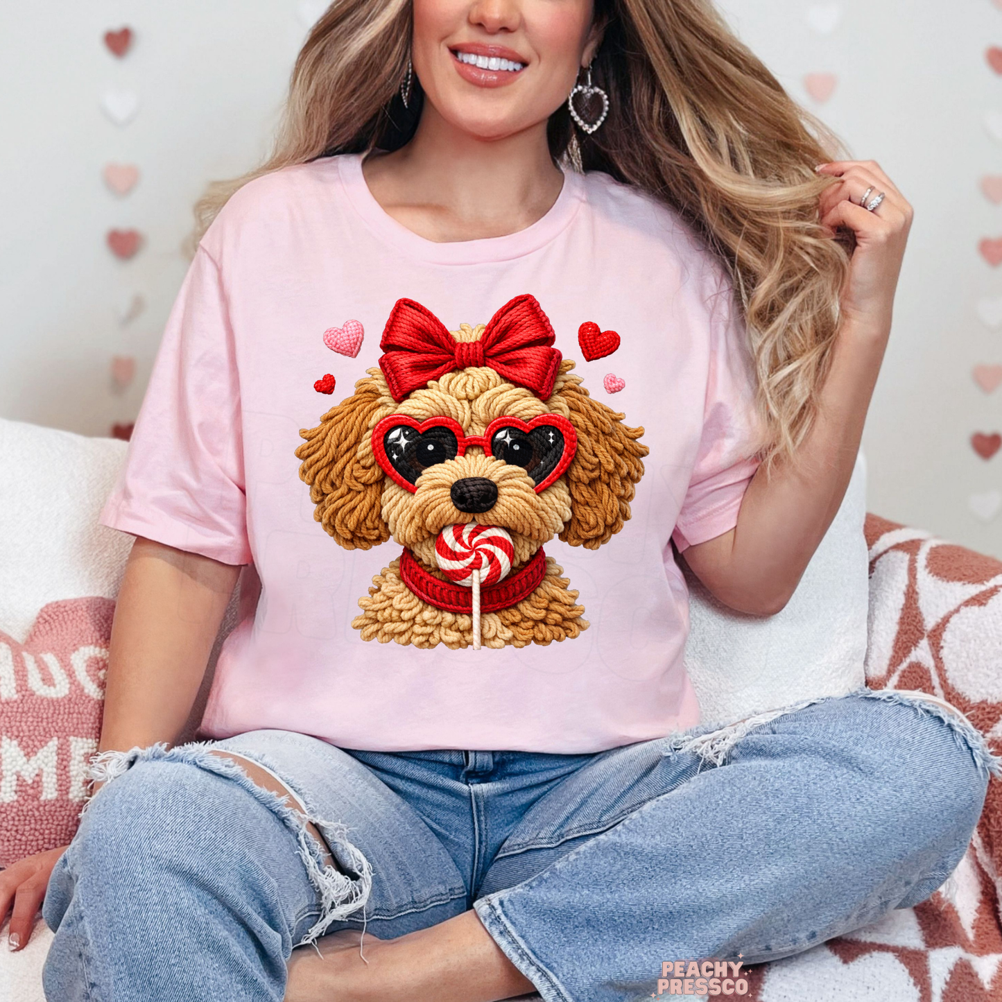 Light pink unisex t-shirt featuring an adorable Valentine's puppy graphic with a red bow, heart sunglasses, and a peppermint lollipop.