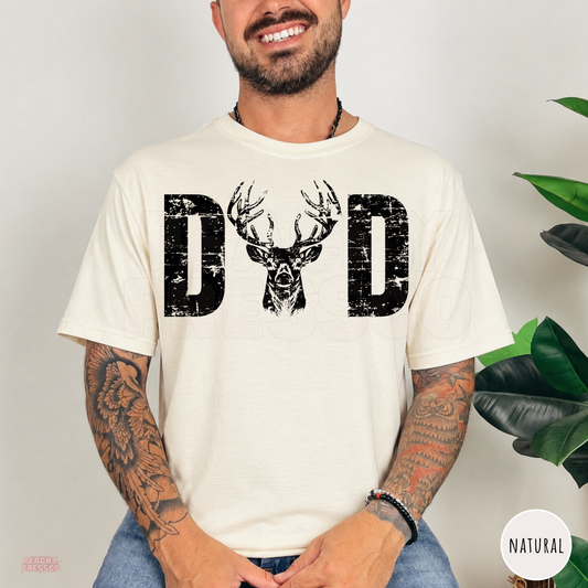 Natural t-shirt featuring a distressed "DAD" graphic with a realistic buck deer head. Perfect gift for dads who enjoy deer hunting, camping, fishing, and the outdoors.