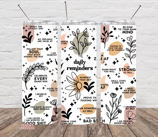 Daily Reminder affirmation tumbler featuring positive motivational quotes, floral illustrations, and a modern boho design on a 20oz skinny tumbler.