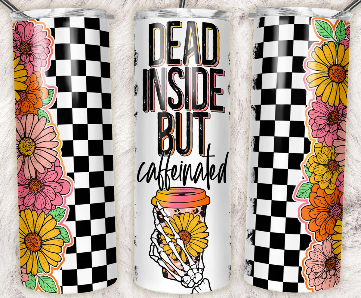 Skinny tumbler with black and white checkerboard pattern, colorful flowers, skeleton hand coffee cup, and the phrase "Dead Inside But Caffeinated."